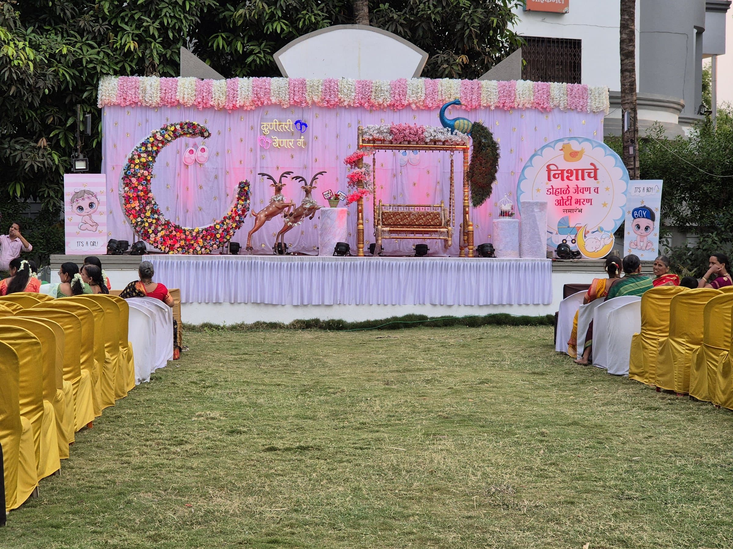Baby shower stage on the lawn at Sai Samrat